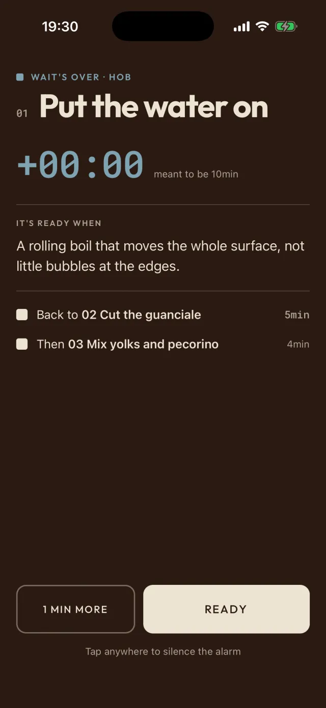 The alarm in the app: the wait is over for the water, right at the 10 minutes it was meant to take. Back to cutting the guanciale, 5 minutes, then the yolks and pecorino, 4; the buttons say ‘1 min more’ and ‘Ready’.